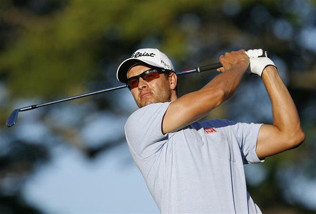 Adam Scott of Australia follows his ball after teeing off on the 11th hole during the first round at the Sony Open golf tournament at Waiala Adam Scott of Australia follows his ball after teeing off on the 11th hole during the first round at the Sony Open golf tournament at Waiala