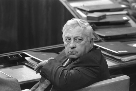 Israel's Minister of Industry and Trade Ariel Sharon sits in a session of Israel's parliament in Jerusalem May 6, 1985 in this file photo re Israel's Minister of Industry and Trade Ariel Sharon sits in a session of Israel's parliament in Jerusalem May 6, 1985 in this file photo re