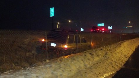 Vehicle in the ditch (Photo from: FOX 11) Vehicle in the ditch (Photo from: FOX 11)