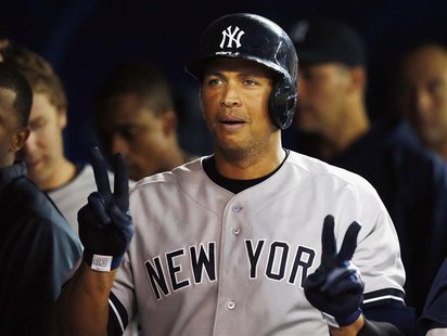 New York Yankees Alex Rodriguez celebrates his home run against the Toronto Blue Jays during the fifth inning of their MLB American League b New York Yankees Alex Rodriguez celebrates his home run against the Toronto Blue Jays during the fifth inning of their MLB American League b