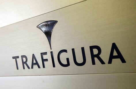 Trafigura logo is pictured in the company entrance in Geneva March 11, 2012. REUTERS/Denis Balibouse Trafigura logo is pictured in the company entrance in Geneva March 11, 2012. REUTERS/Denis Balibouse
