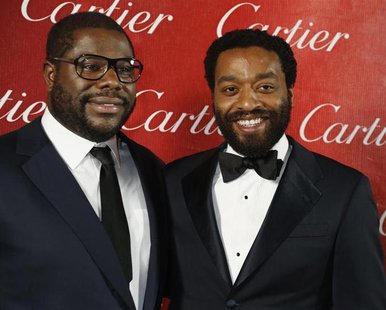 British film director Steve McQueen (L) poses backstage with the star of his film Chiwetel Ejiofor from "12 Years A Slave" after winning Dir British film director Steve McQueen (L) poses backstage with the star of his film Chiwetel Ejiofor from "12 Years A Slave" after winning Dir