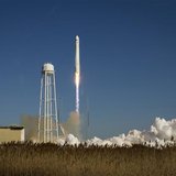 An Orbital Sciences Corporation Antares rocket is seen as it launches from Pad-0A at NASA's Wallops Flight Facility at Wallops Island, Virgi An Orbital Sciences Corporation Antares rocket is seen as it launches from Pad-0A at NASA's Wallops Flight Facility at Wallops Island, Virgi