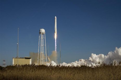 An Orbital Sciences Corporation Antares rocket is seen as it launches from Pad-0A at NASA's Wallops Flight Facility at Wallops Island, Virgi An Orbital Sciences Corporation Antares rocket is seen as it launches from Pad-0A at NASA's Wallops Flight Facility at Wallops Island, Virgi