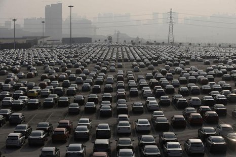 New cars are seen at a parking lot of Changan Ford Mazda Automobile Co. Ltd, Ford Motor's joint venture in China, in Chongqing Municipality New cars are seen at a parking lot of Changan Ford Mazda Automobile Co. Ltd, Ford Motor's joint venture in China, in Chongqing Municipality