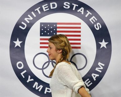 Figure skater Ashley Wagner walks offstage after being introduced as part of the United States' women's figure skating team for the upcoming Figure skater Ashley Wagner walks offstage after being introduced as part of the United States' women's figure skating team for the upcoming