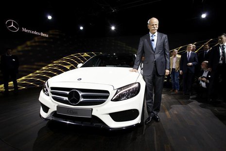 Chairman of Daimler AG and Head of Mercedes-Benz Cars Dieter Zetsche stands next to the new Mercedes-Benz 2015 C-Class during a private prev Chairman of Daimler AG and Head of Mercedes-Benz Cars Dieter Zetsche stands next to the new Mercedes-Benz 2015 C-Class during a private prev