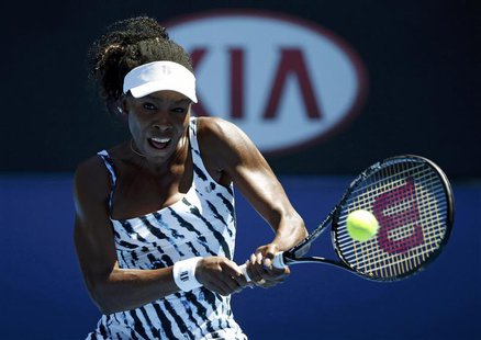 Venus Williams of the U.S. hits a return to Ekaterina Makarova of Russia during their women's singles match at the Australian Open 2014 tenn Venus Williams of the U.S. hits a return to Ekaterina Makarova of Russia during their women's singles match at the Australian Open 2014 tenn