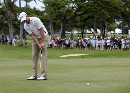 Jimmy Walker of the U.S. putts on the 18th green during the third round of the Sony Open golf tournament at Waialae Country Club in Honolulu Jimmy Walker of the U.S. putts on the 18th green during the third round of the Sony Open golf tournament at Waialae Country Club in Honolulu
