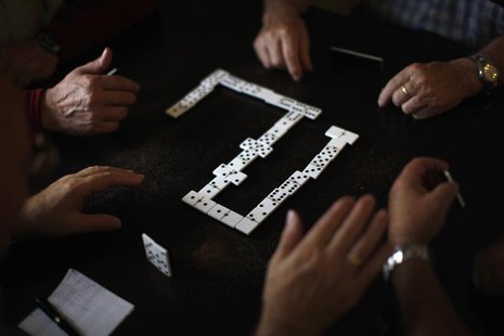 Pensioners play dominoes at a seniors centre during the International Day of Older Persons in Ronda, near Malaga October 1, 2013. REUTERS/Jo Pensioners play dominoes at a seniors centre during the International Day of Older Persons in Ronda, near Malaga October 1, 2013. REUTERS/Jo