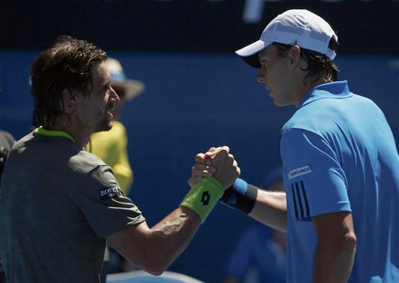 David Ferrer of Spain clasps hands with Alejandro Gonzalez of Colombia after winning their men's singles match at the Australian Open 2014 t David Ferrer of Spain clasps hands with Alejandro Gonzalez of Colombia after winning their men's singles match at the Australian Open 2014 t