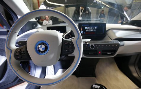 The steering wheel is pictured at the serial production BMW i3 electric car in the BMW factory in Leipzig September 18, 2013. REUTERS/Fabriz The steering wheel is pictured at the serial production BMW i3 electric car in the BMW factory in Leipzig September 18, 2013. REUTERS/Fabriz