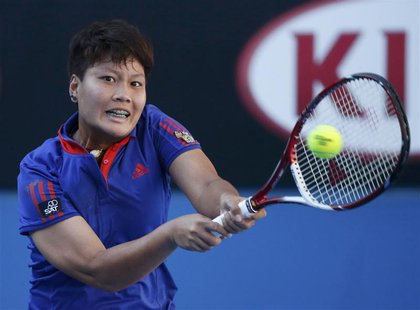 Luksika Kumkhum of Thailand hits a return to Petra Kvitova of the Czech Republic at the Australian Open 2014 tennis tournament in Melbourne Luksika Kumkhum of Thailand hits a return to Petra Kvitova of the Czech Republic at the Australian Open 2014 tennis tournament in Melbourne