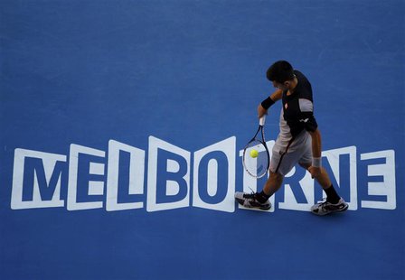 Novak Djokovic of Serbia walks during a break between points during his men's singles match against Lukas Lacko of Slovakia at the Australia Novak Djokovic of Serbia walks during a break between points during his men's singles match against Lukas Lacko of Slovakia at the Australia