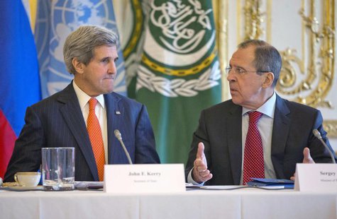 U.S. Secretary of State John Kerry (L) listens to Russia's Foreign Minister Sergei Lavrov before the start of their joint meeting with U.N/A U.S. Secretary of State John Kerry (L) listens to Russia's Foreign Minister Sergei Lavrov before the start of their joint meeting with U.N/A