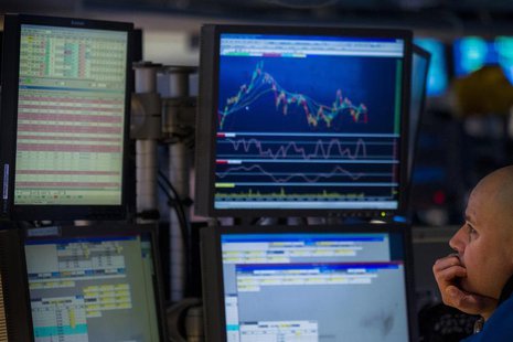 A trader watches multiple screens while at work on the floor of the New York Stock Exchange January 10, 2014. REUTERS/Brendan McDermid A trader watches multiple screens while at work on the floor of the New York Stock Exchange January 10, 2014. REUTERS/Brendan McDermid