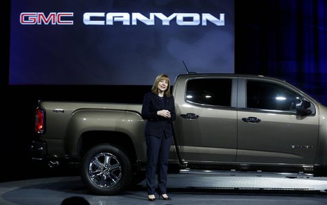 Mary Barra, incoming CEO of General Motors Co., reveals the 2015 GMC Canyon pickup truck in an industrial building in advance of the media p Mary Barra, incoming CEO of General Motors Co., reveals the 2015 GMC Canyon pickup truck in an industrial building in advance of the media p