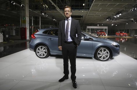 CEO of Volvo Cars Hakan Samuelsson poses for a photo next to a Volvo V40 TS car at the new Volvo automobile manufacturing plant in Chengdu, CEO of Volvo Cars Hakan Samuelsson poses for a photo next to a Volvo V40 TS car at the new Volvo automobile manufacturing plant in Chengdu,