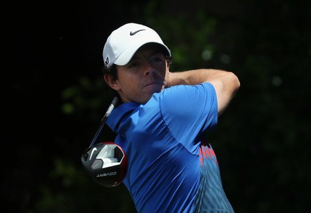 Northern Ireland's Rory McIlroy hits a shot on the seventh hole during the fourth round of the Australian Open golf tournament at Royal Sydn Northern Ireland's Rory McIlroy hits a shot on the seventh hole during the fourth round of the Australian Open golf tournament at Royal Sydn