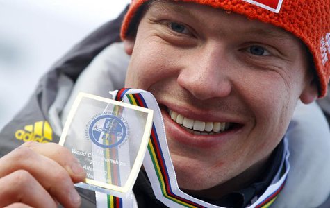 Germany's Felix Loch presents his gold medal after winning the FIL Luge World Championships in Altenberg February 11, 2012. REUTERS/Dominic Germany's Felix Loch presents his gold medal after winning the FIL Luge World Championships in Altenberg February 11, 2012. REUTERS/Dominic