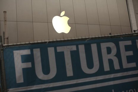 The Apple logo is pictured on the front of the company's flagship retail store near signs for the central subway project in San Francisco, C The Apple logo is pictured on the front of the company's flagship retail store near signs for the central subway project in San Francisco, C