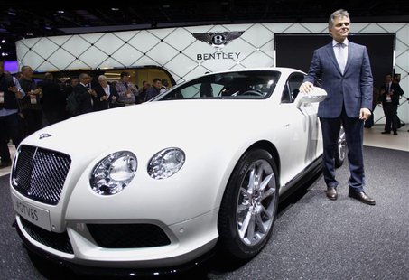 Dr. Wolfgang Schreiber, Chairman and CEO of Bentley, speaks next to the Bentley GT V8 S during the press preview day of the North American I Dr. Wolfgang Schreiber, Chairman and CEO of Bentley, speaks next to the Bentley GT V8 S during the press preview day of the North American I