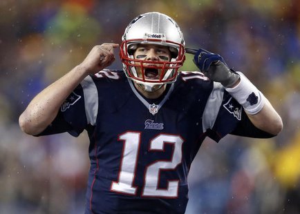 Jan 11, 2014; Foxborough, MA, USA; New England Patriots quarterback Tom Brady (12) gestures at the line in the second half during the 2013 A Jan 11, 2014; Foxborough, MA, USA; New England Patriots quarterback Tom Brady (12) gestures at the line in the second half during the 2013 A