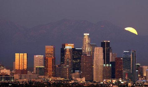 The Los Angeles downtown skyline is pictured from the Baldwin Hills State Park as a full moon rises from the San Gabriel mountains in Culver The Los Angeles downtown skyline is pictured from the Baldwin Hills State Park as a full moon rises from the San Gabriel mountains in Culver