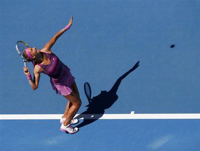 Victoria Azarenka of Belarus serves to Johanna Larsson of Sweden during their women's singles match at the Australian Open 2014 tennis tourn Victoria Azarenka of Belarus serves to Johanna Larsson of Sweden during their women's singles match at the Australian Open 2014 tennis tourn