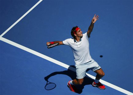 Roger Federer of Switzerland serves to James Duckworth of Australia during their men's singles match at the Australian Open 2014 tennis tour Roger Federer of Switzerland serves to James Duckworth of Australia during their men's singles match at the Australian Open 2014 tennis tour