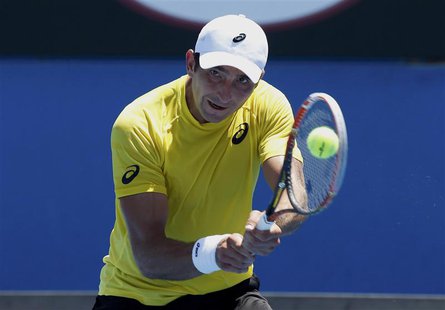 Marinko Matosevic of Australia hits a return to Kei Nishikori of Japan during their men's singles at the Australian Open 2014 tennis tournam Marinko Matosevic of Australia hits a return to Kei Nishikori of Japan during their men's singles at the Australian Open 2014 tennis tournam