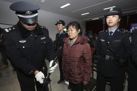 Zhang Shuxia, an obstetrician involved in baby trafficking, stands trial in Weinan Intermediate People's Court in Weinan, Shaanxi province, Zhang Shuxia, an obstetrician involved in baby trafficking, stands trial in Weinan Intermediate People's Court in Weinan, Shaanxi province,