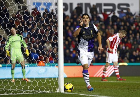Liverpool's Luis Suarez (C) celebrates his goal against Stoke City during their English Premier League soccer match at the Britannia stadium Liverpool's Luis Suarez (C) celebrates his goal against Stoke City during their English Premier League soccer match at the Britannia stadium