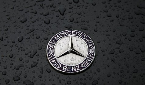The logo of German car manufacturer Mercedes-Benz, a subsidiary of Daimler AG, is pictured covered with raindrops at a Mercedes-Benz branch The logo of German car manufacturer Mercedes-Benz, a subsidiary of Daimler AG, is pictured covered with raindrops at a Mercedes-Benz branch