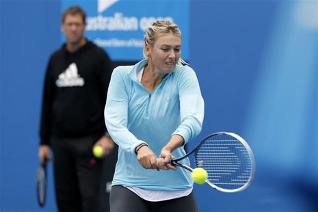 Maria Sharapova of Russia hits a return during a practice session at the Australian Open 2014 tennis tournament in Melbourne January 12, 201 Maria Sharapova of Russia hits a return during a practice session at the Australian Open 2014 tennis tournament in Melbourne January 12, 201