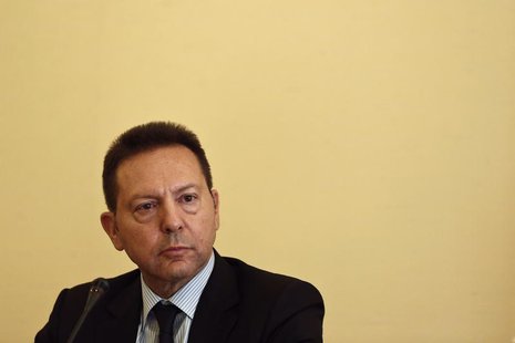 Greece's Finance Minister Yannis Stournaras looks on during a presentation by the Organisation for Economic Co-operation and Development (OE Greece's Finance Minister Yannis Stournaras looks on during a presentation by the Organisation for Economic Co-operation and Development (OE