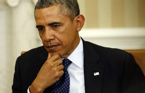 U.S. President Barack Obama listens to remarks during his meeting with Spanish Prime Minister Mariano Rajoy in the Oval Office of the White U.S. President Barack Obama listens to remarks during his meeting with Spanish Prime Minister Mariano Rajoy in the Oval Office of the White