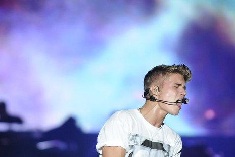 Canadian pop singer Justin Bieber performs during his "Believe" concert at the Olimpic Stadium in Santo Domingo October 22, 2013. REUTERS/Ri Canadian pop singer Justin Bieber performs during his "Believe" concert at the Olimpic Stadium in Santo Domingo October 22, 2013. REUTERS/Ri
