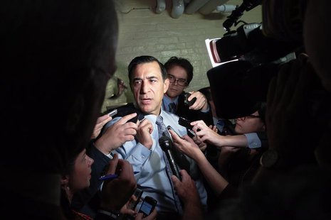 U.S. Representative Darrell Issa (R-CA) talks to reporters as he departs a House Republican caucus meeting at the U.S. Capitol in Washington U.S. Representative Darrell Issa (R-CA) talks to reporters as he departs a House Republican caucus meeting at the U.S. Capitol in Washington