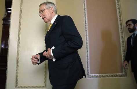 U.S. Senate Majority Leader Harry Reid (R-NV) walks to meet reporters after their weekly party caucus lunch meeting at the U.S. Capitol in W U.S. Senate Majority Leader Harry Reid (R-NV) walks to meet reporters after their weekly party caucus lunch meeting at the U.S. Capitol in W