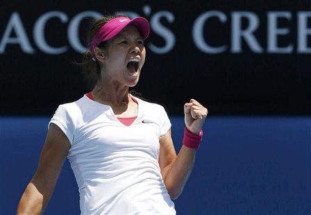Li Na of China celebrates defeating Belinda Bencic of Switzerland in their women's singles match at the Australian Open 2014 tennis tourname Li Na of China celebrates defeating Belinda Bencic of Switzerland in their women's singles match at the Australian Open 2014 tennis tourname