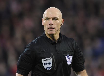 Referee Howard Webb looks on during the English Premier League soccer match between Cardiff City and West Bromwich Albion at Cardiff City St Referee Howard Webb looks on during the English Premier League soccer match between Cardiff City and West Bromwich Albion at Cardiff City St