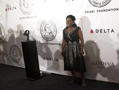 Singer Sharon Jones poses as she arrives before The Friars Club and Friars Foundation honored Tom Cruise with the Entertainment Icon Award a Singer Sharon Jones poses as she arrives before The Friars Club and Friars Foundation honored Tom Cruise with the Entertainment Icon Award a