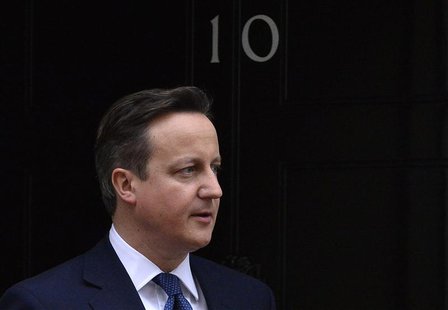 Britain's Prime Minister David Cameron waits to greet Cyprus's President Nicos Anastasiades at Cameron's official residence in Downing Stree Britain's Prime Minister David Cameron waits to greet Cyprus's President Nicos Anastasiades at Cameron's official residence in Downing Stree