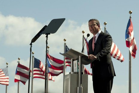 Alejandro Garcia Padilla makes his inaugural speech as the 10th Governor of the Commonwealth of Puerto Rico in San Juan, January 2, 2013. RE Alejandro Garcia Padilla makes his inaugural speech as the 10th Governor of the Commonwealth of Puerto Rico in San Juan, January 2, 2013. RE