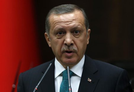 Turkey's Prime Minister Tayyip Erdogan addresses members of parliament from his ruling AK Party (AKP) during a meeting at the parliament in Turkey's Prime Minister Tayyip Erdogan addresses members of parliament from his ruling AK Party (AKP) during a meeting at the parliament in