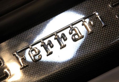 A Ferrari logo is pictured on the footboard of the newly launched F12 Berlinetta car during the second media day of the 82nd Geneva Auto Sho A Ferrari logo is pictured on the footboard of the newly launched F12 Berlinetta car during the second media day of the 82nd Geneva Auto Sho
