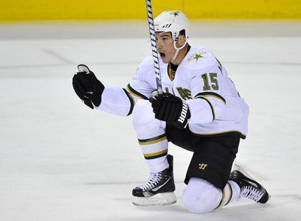 Dallas Stars' Jamie Langenbrunner celebrates his goal during the second period of their NHL hockey game against the Calgary Flames in Calgar Dallas Stars' Jamie Langenbrunner celebrates his goal during the second period of their NHL hockey game against the Calgary Flames in Calgar