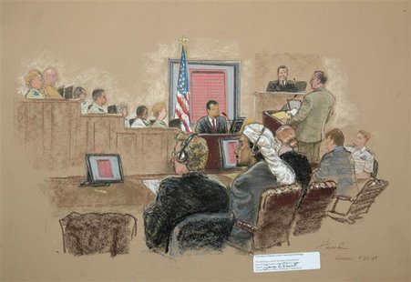 In this photograph of a sketch by courtroom artist Janet Hamlin, reviewed by the U.S. Military, defendant Salim Hamdan (front, 2nd L) looks In this photograph of a sketch by courtroom artist Janet Hamlin, reviewed by the U.S. Military, defendant Salim Hamdan (front, 2nd L) looks