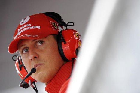 Former Ferrari driver Michael Schumacher of Germany looks on during the qualifying session for the Italian F1 Grand Prix race at the Monza r Former Ferrari driver Michael Schumacher of Germany looks on during the qualifying session for the Italian F1 Grand Prix race at the Monza r